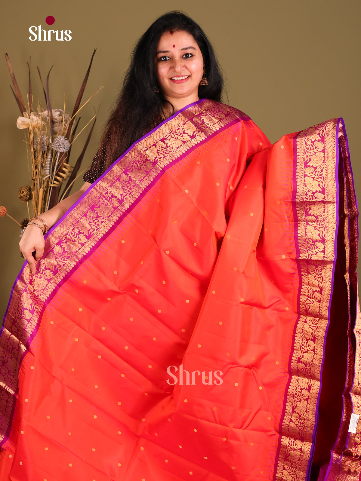 Vibrant Orange Gadwal silk Saree with gold zari buttas & Purple Brocade Pallu-1