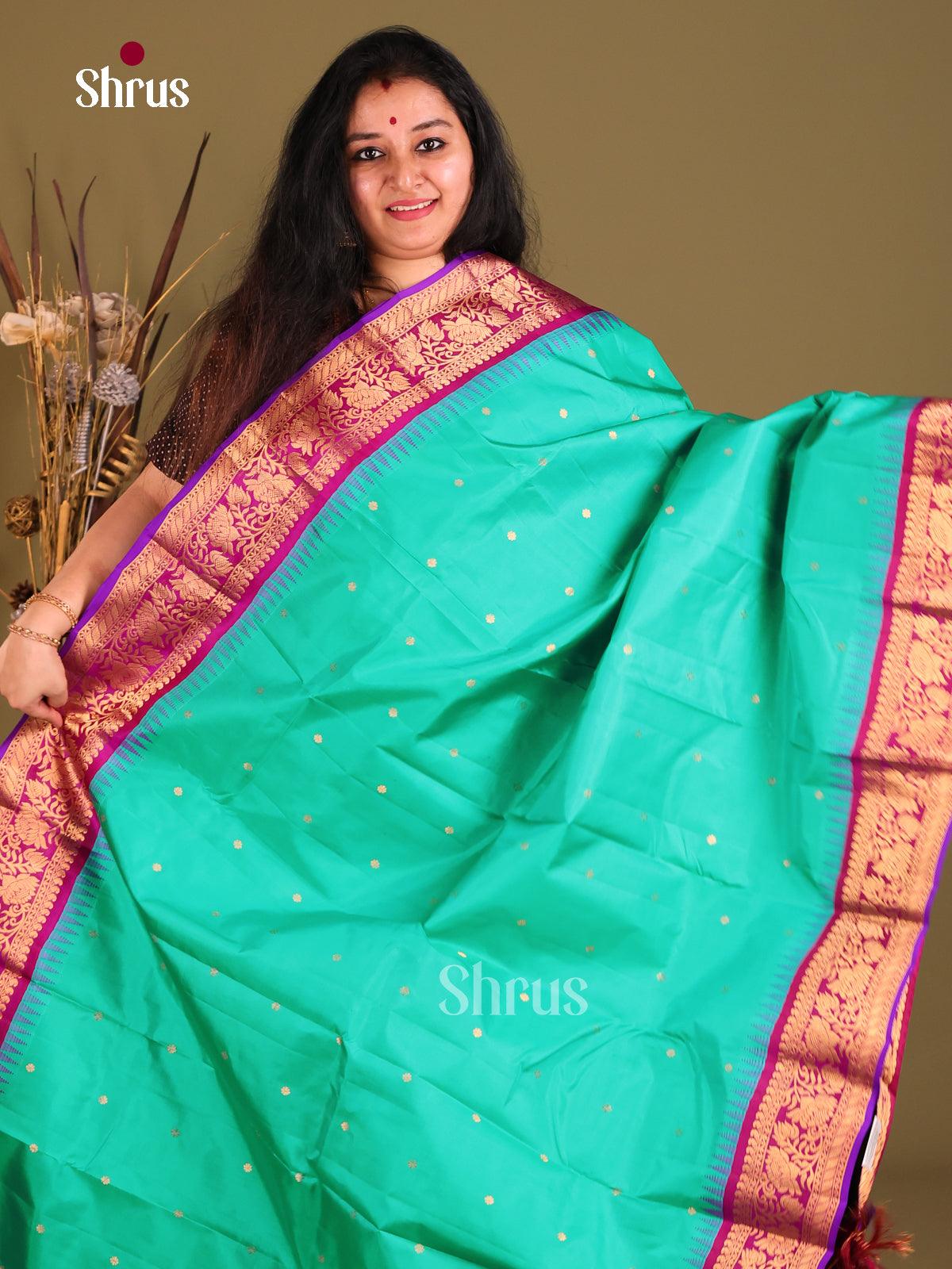 Serene Green Gadwal silk Saree with Golden Buttas & Magenta floral vines border-1