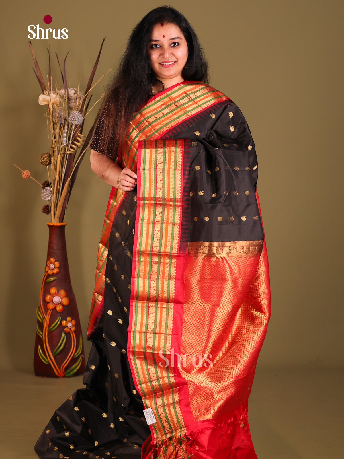 Majestic Black Gadwal silk Saree with peacock buttas & Red Zari Woven Pallu