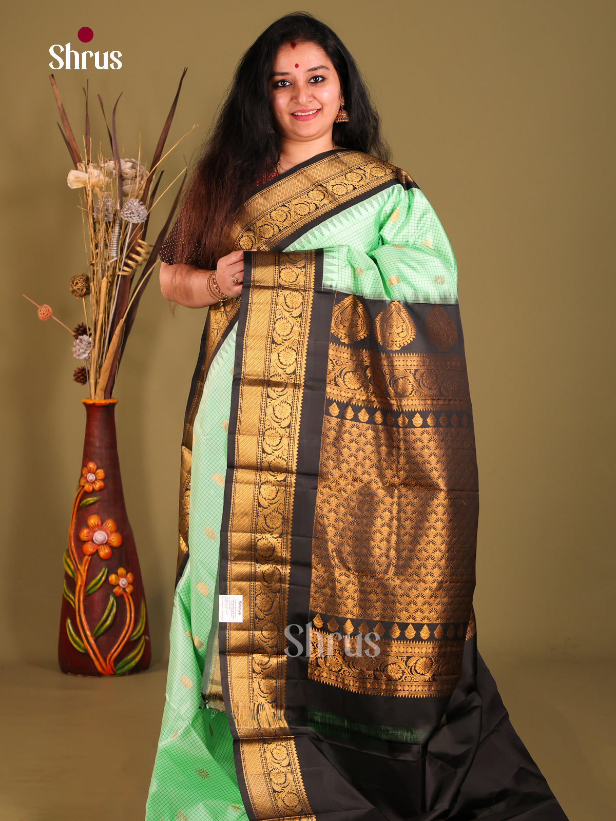 Lush Pista Green Gadwal silk Saree with Checks, Zari Buttas & Black Border