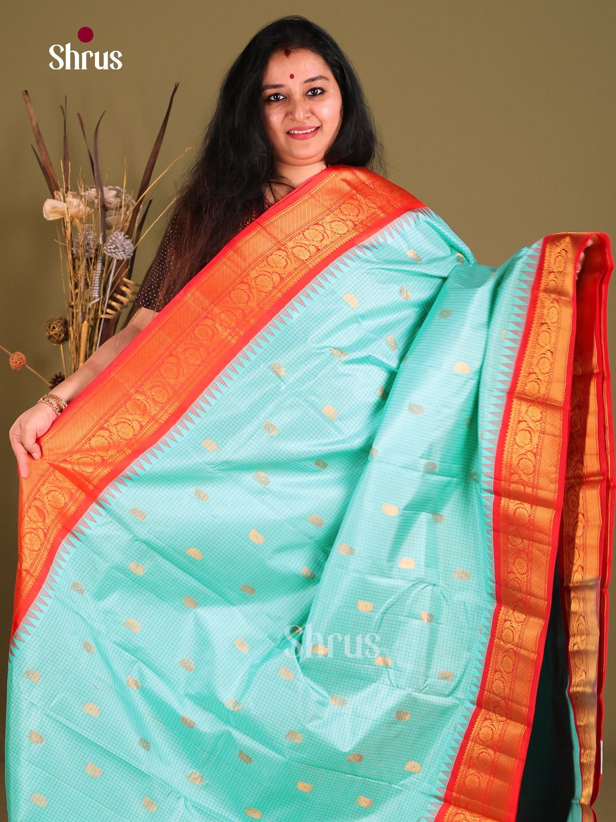 Exquisite Teal Blue Gadwal silk Saree with Gold Buttas & Rich Zari Border in Red-1