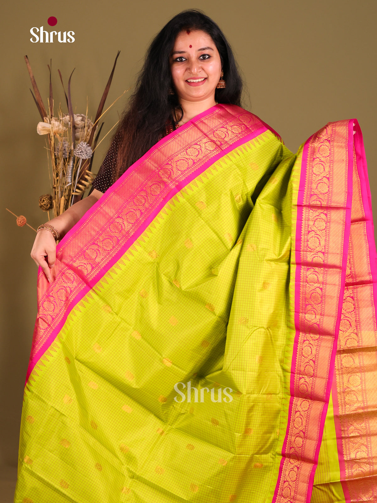 Luminous Light Green Gadwal silk Saree with Zari Kattam, Golden Buttas & Pink border-1