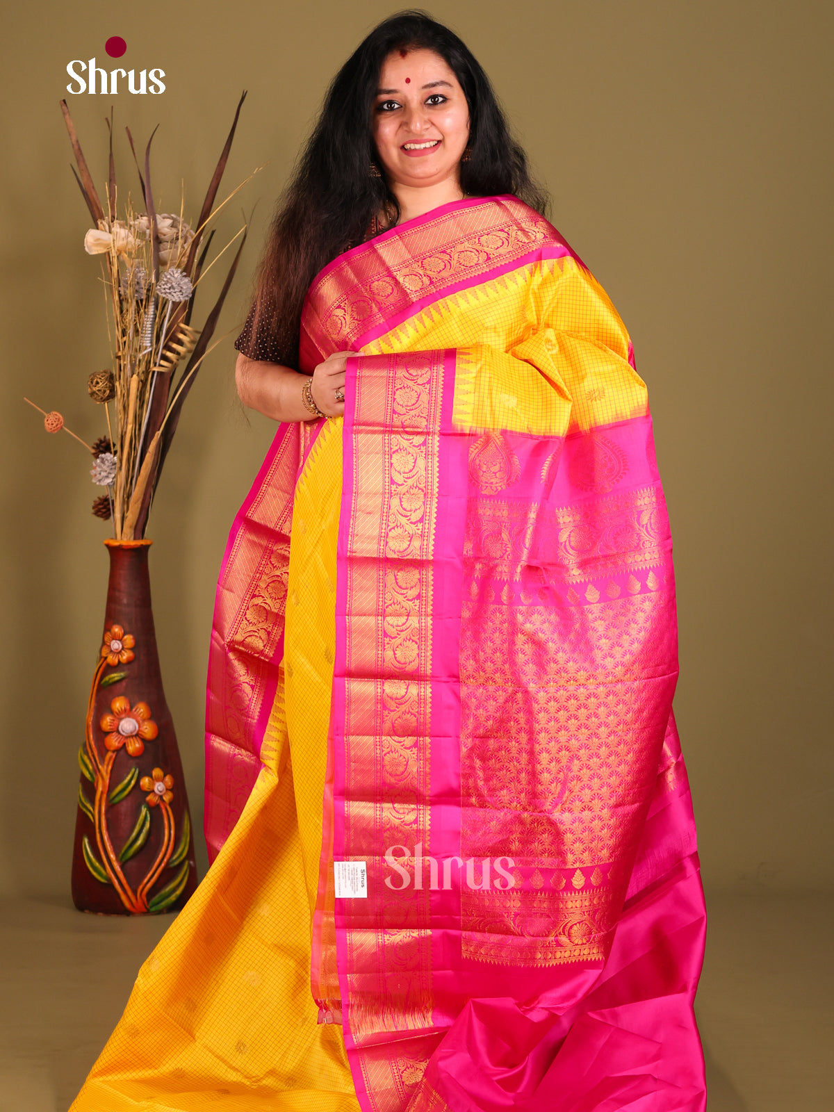 Bright Yellow Gadwal silk Saree with checks, floral buttas & Pink Zari Border