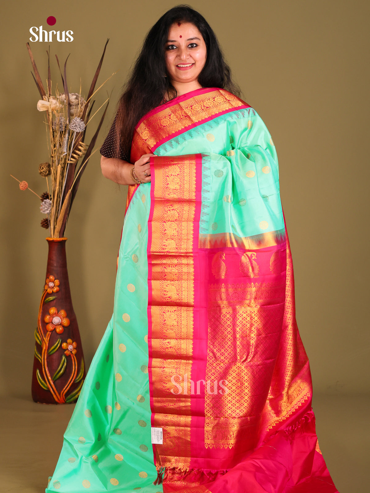 Beautiful Teal Green Gadwal silk Saree with gold buttas & Pink Brocade Pallu