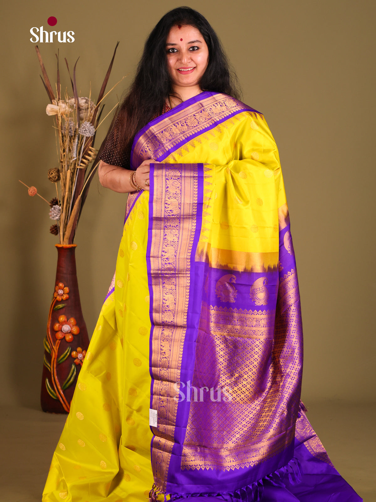 Classic Mustardy Green Gadwal silk Saree with gold zari buttas & violet Brocade Pallu