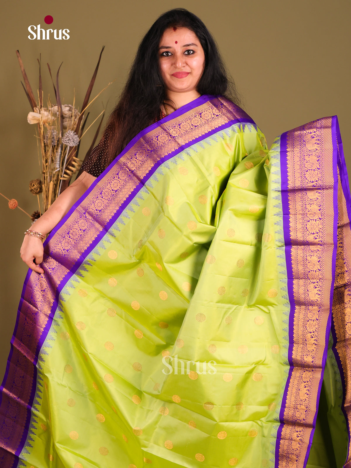 Regal Light Green Gadwal silk Saree with ZAri Floral Buttas & rich Violet border-1