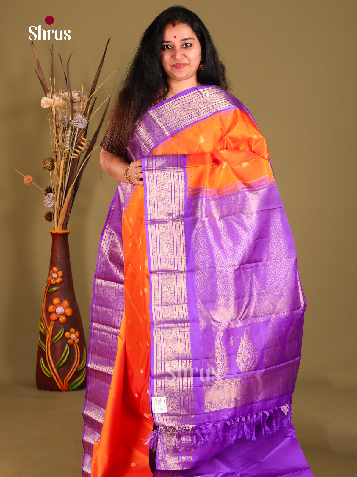 Regal Orange Gadwal Silk Saree with Manga Buttas & Purple Brocade Pallu