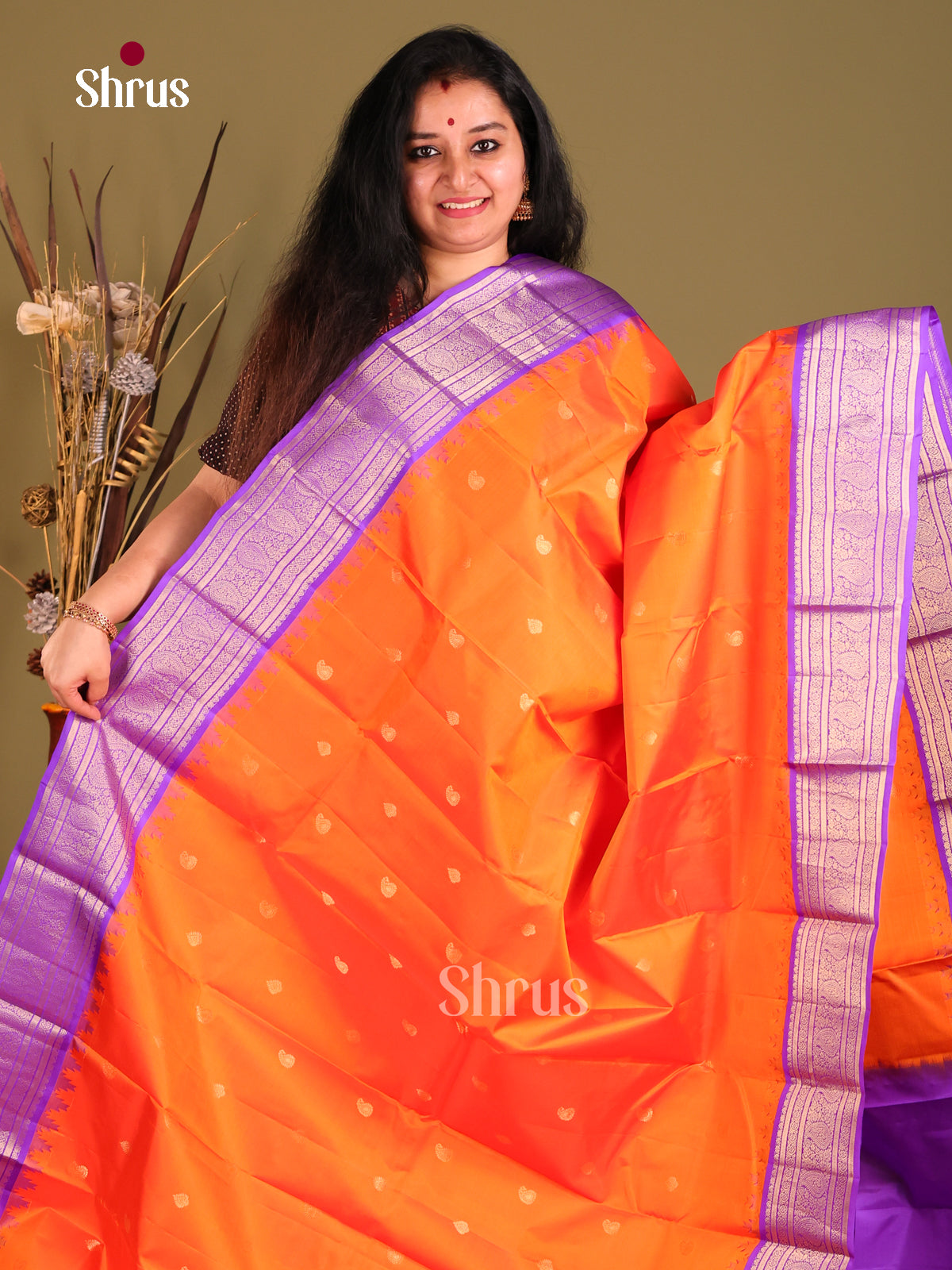 Regal Orange Gadwal Silk Saree with Manga Buttas & Purple Brocade Pallu-1