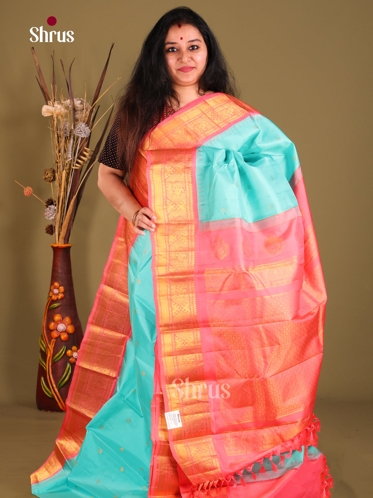 Serene Teal Blue Gadwal silk Saree with Zari Woven Pink Border