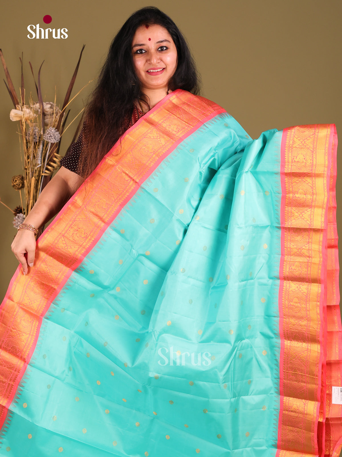 Serene Teal Blue Gadwal silk Saree with Zari Woven Pink Border-1