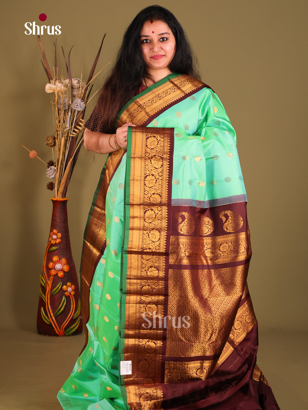 Stunning Teal Green Gadwal silk Saree with zari floral buttas & Rich Brown Pallu
