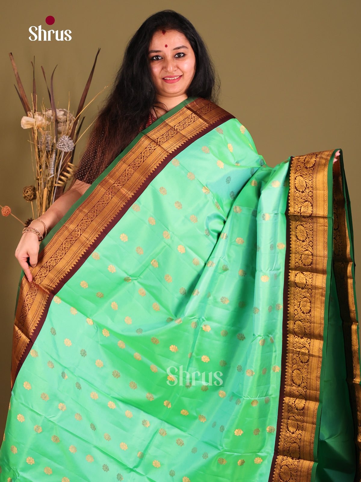 Stunning Teal Green Gadwal silk Saree with zari floral buttas & Rich Brown Pallu-1