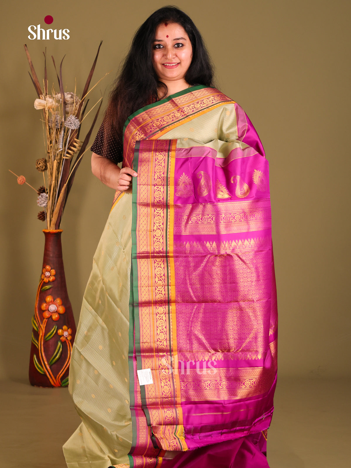 Glamorous Pista Green & Purple Gadwal silk Saree with checks & zari buttas