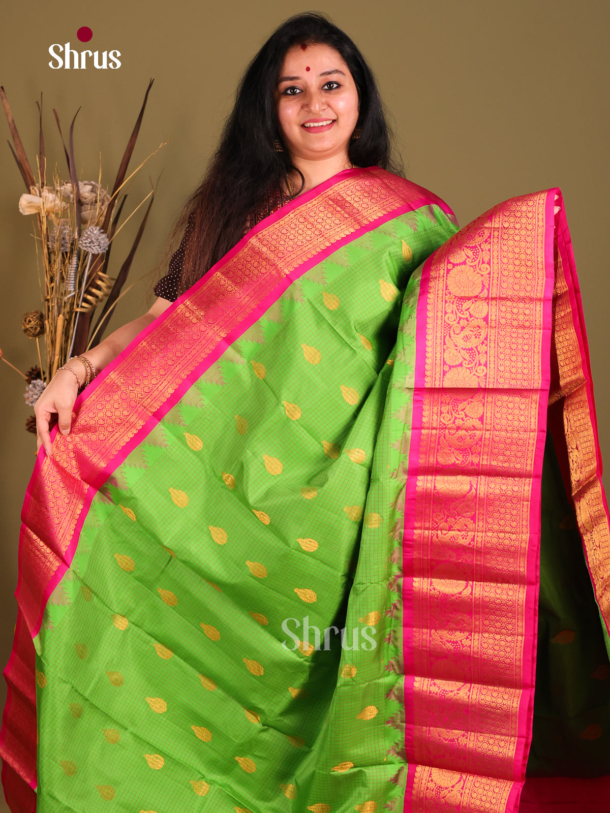 Exquisite Green Gadwal silk Saree with Zari checks, gold buttas & Pink Zari Border-1