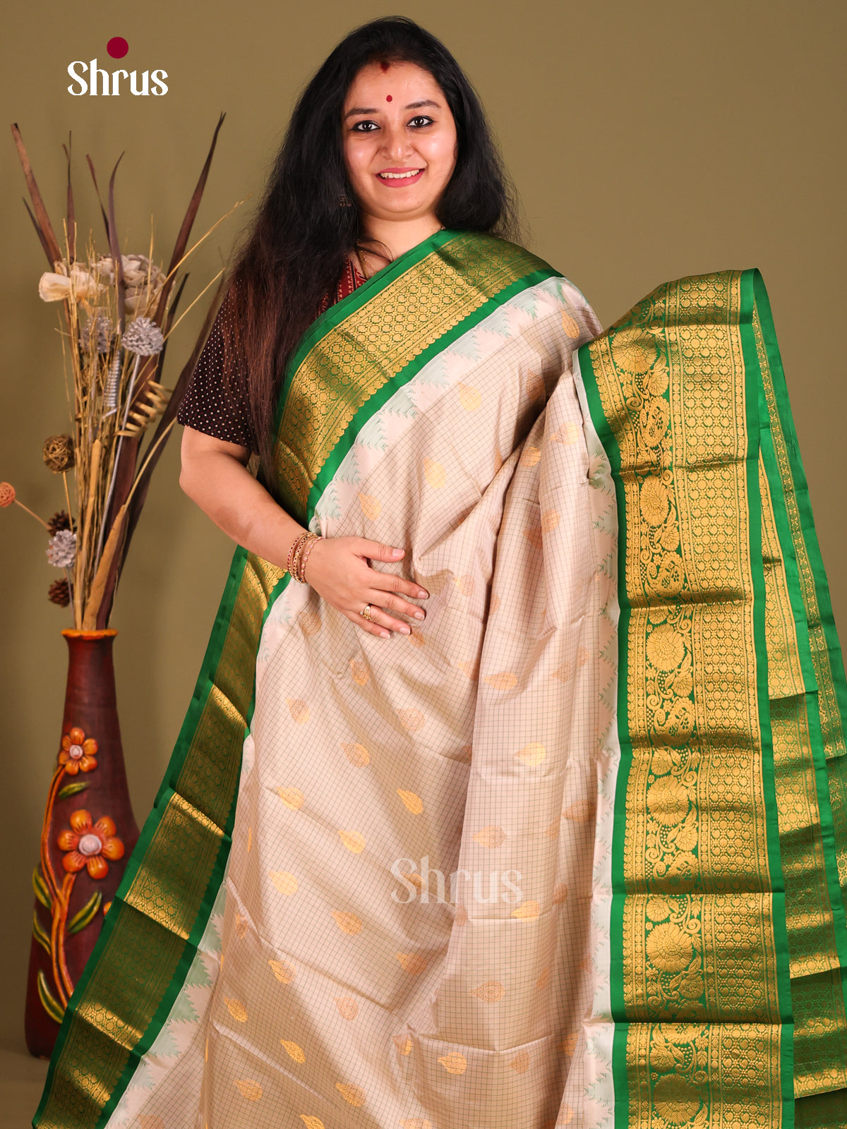 Glistening Cream & Green Gadwal silk Saree with subtle checks & Zari Buttas-1