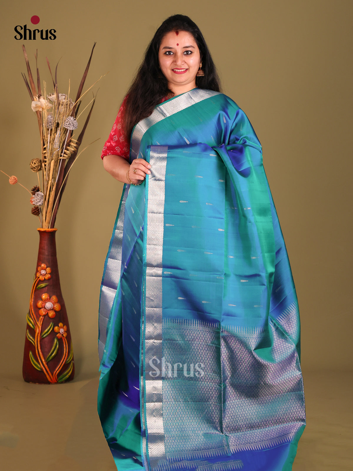 Elegant Peacock blue Soft Silk Saree with zari border-1