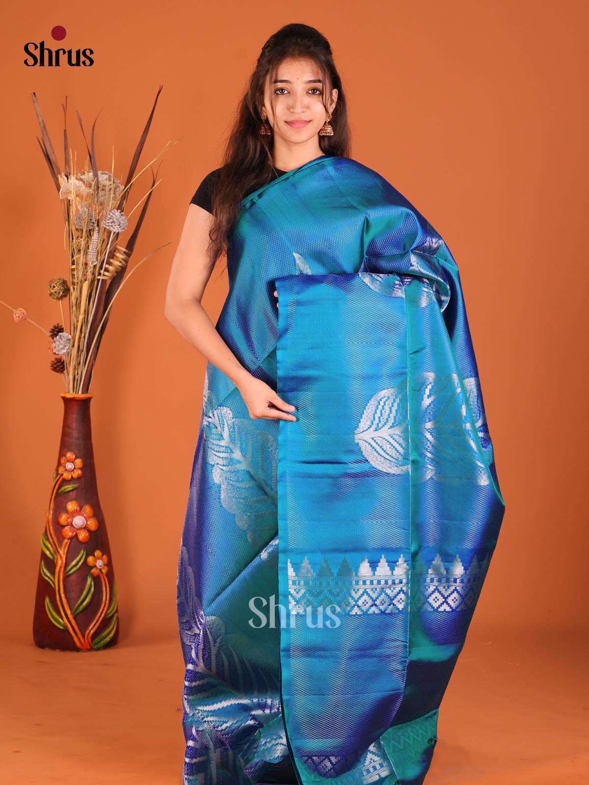 Blue Single Tone Soft Silk Saree gleams with zari leaf motifs-1