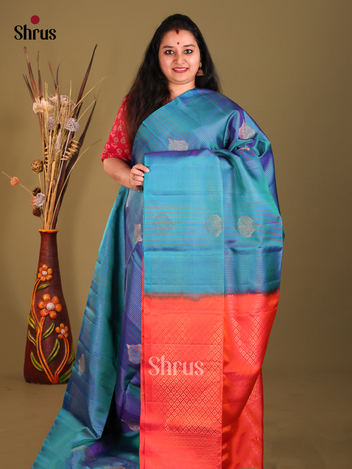 Blue & Orangish Pink Soft Silk Saree with zari stripes, floral motifs