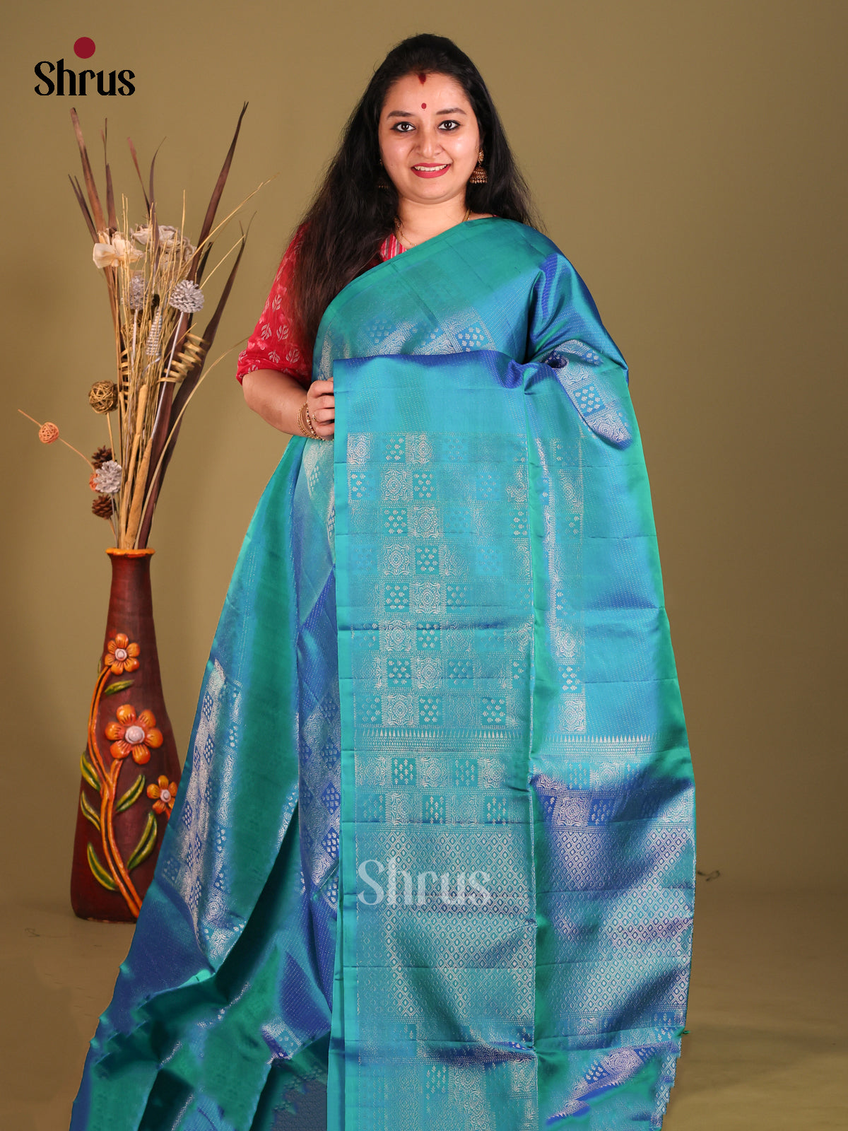 Peacock Blue single Tone Soft Silk Saree with zari floral brocade - Shop on Shrus.com