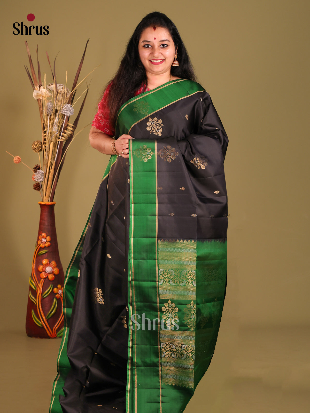 Black & Green Soft Silk Saree gleams with gold, silver zari floral motifs-1