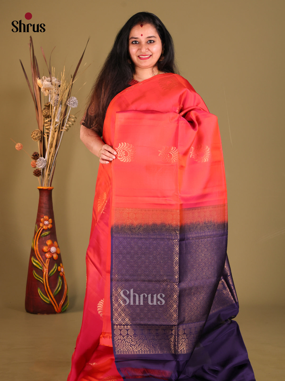 Orangish Pink & Blue Softsilk-halfpure Saree gleams with zari floral motifs - Shop on Shrus.com