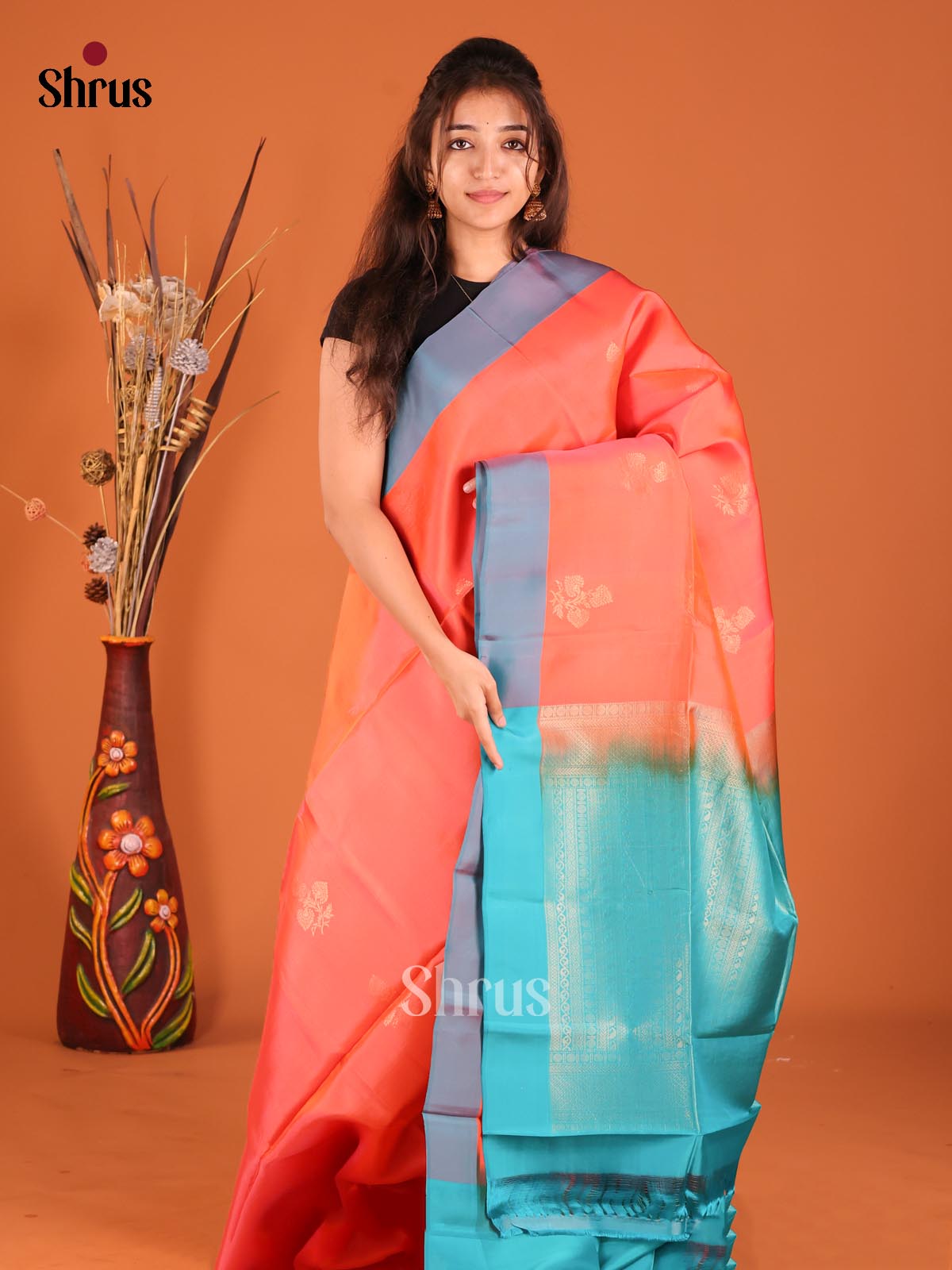 Orange & Blue Softsilk-halfpure Saree gleams with zari floral buttas - Shop on Shrus.com
