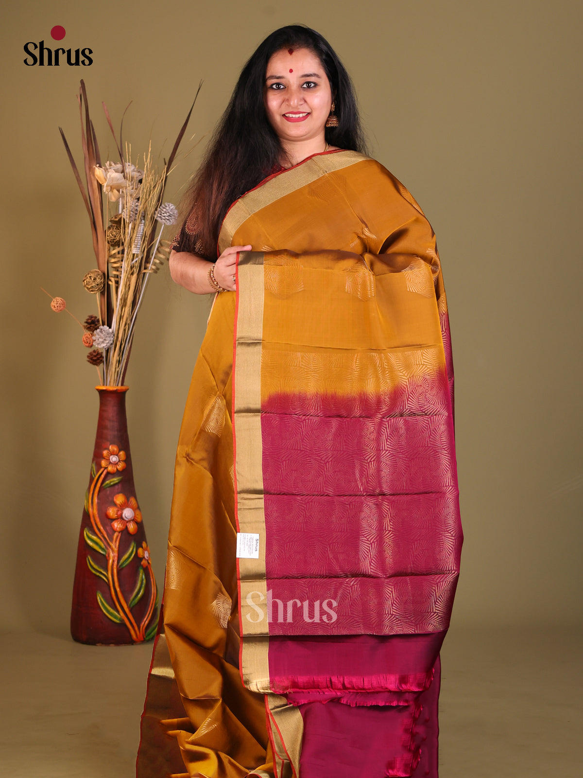 Mustard & Maroon Softsilk-halfpure Saree with gold zari motifs