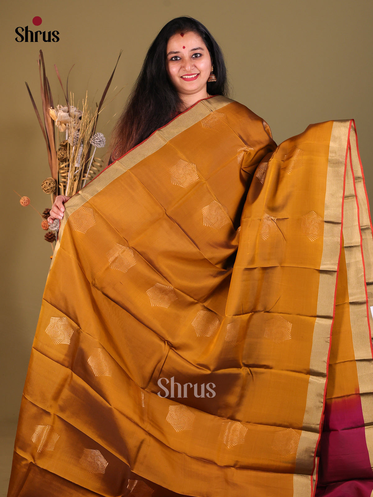 Mustard & Maroon Softsilk-halfpure Saree with gold zari motifs