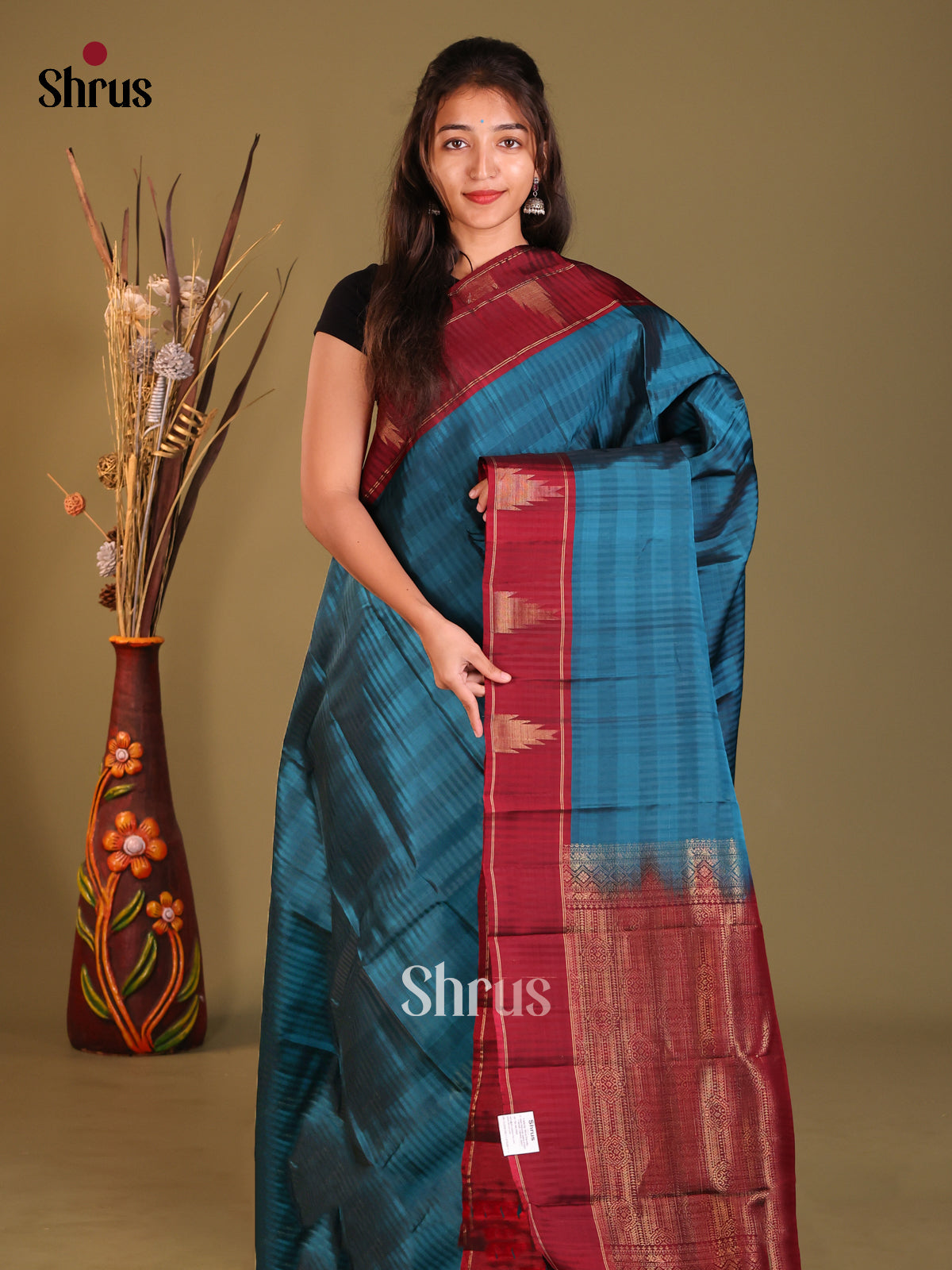 Blue & Maroon Softsilk-halfpure Saree with contrast temple motifs in the border