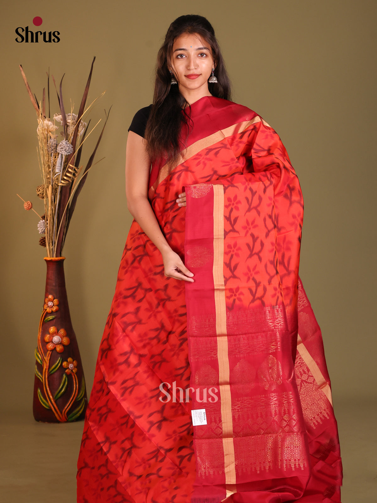 Orange & Red Softsilk-halfpure Saree with ikkat floral nestling