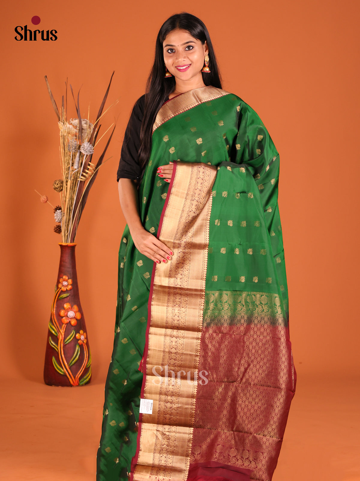 Green & Maroon Softsilk-halfpure Saree gleams with zari peacock buttas - Shop on Shrus.com