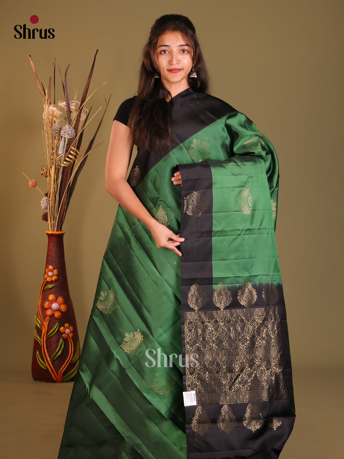 Green & Black Softsilk-halfpure Saree gleams with gold zari floral motifs - Shop on Shrus.com
