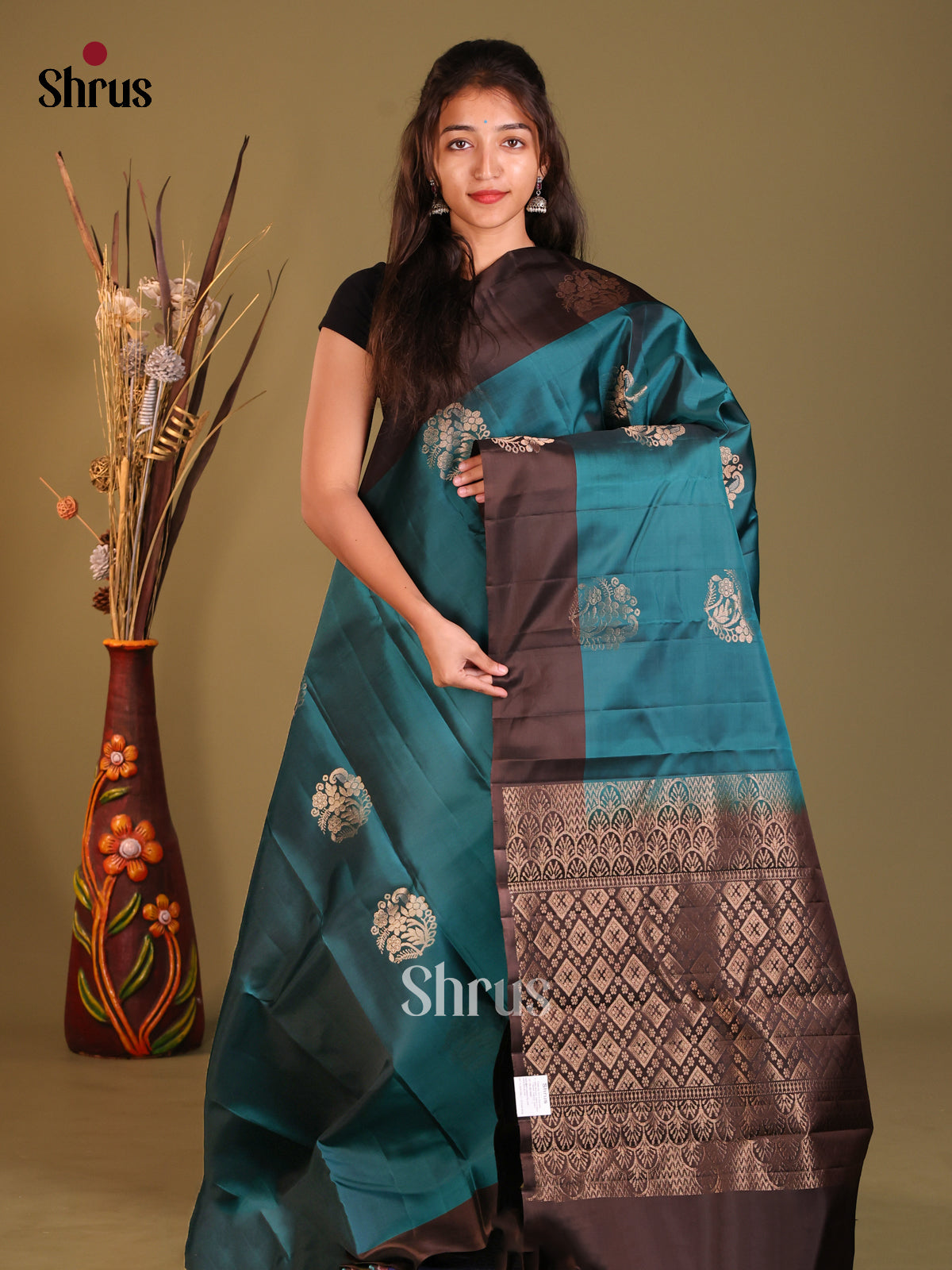 Classic Blue Softsilk-halfpure Saree gleams with gold zari floral motifs