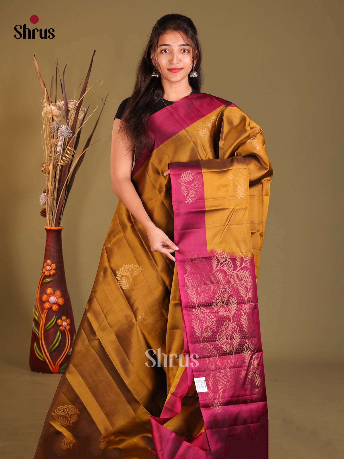 Mustard & Purple Softsilk-halfpure Saree gleams with zari floral motifs - Shop on Shrus.com