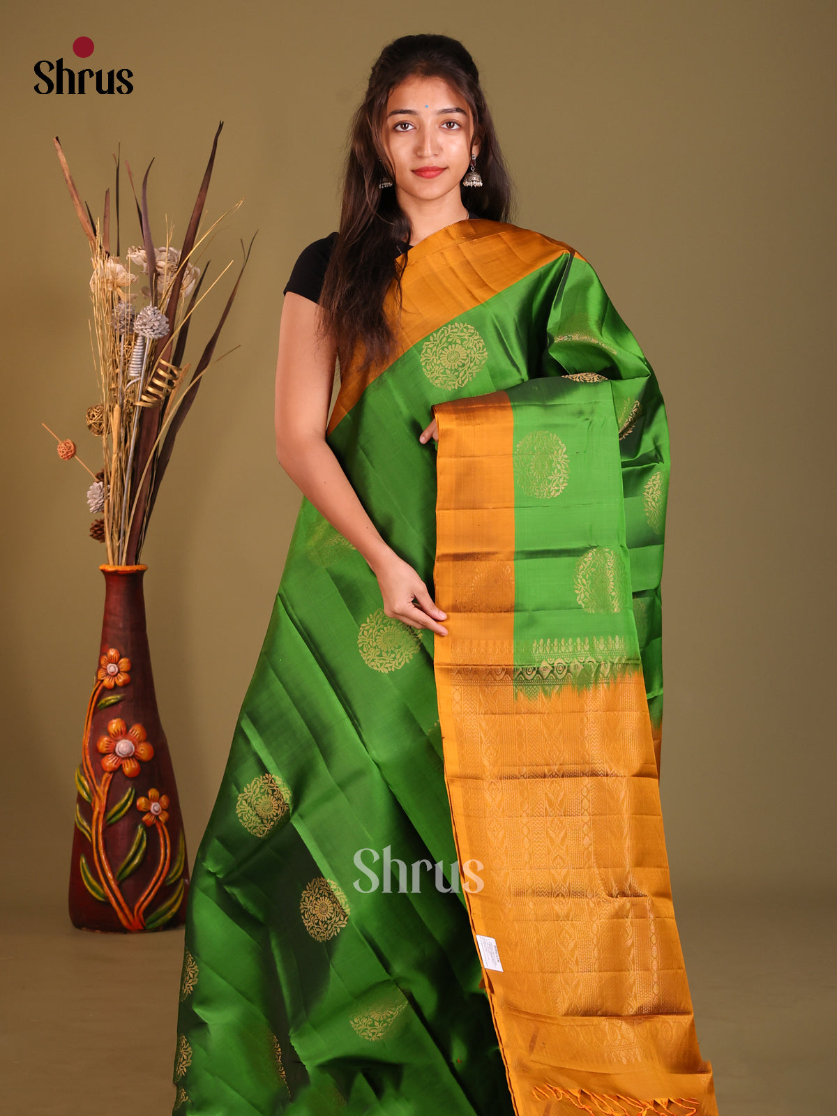 Green & Mustard Softsilk-halfpure Saree with zari floral motifs - Shop on Shrus.com