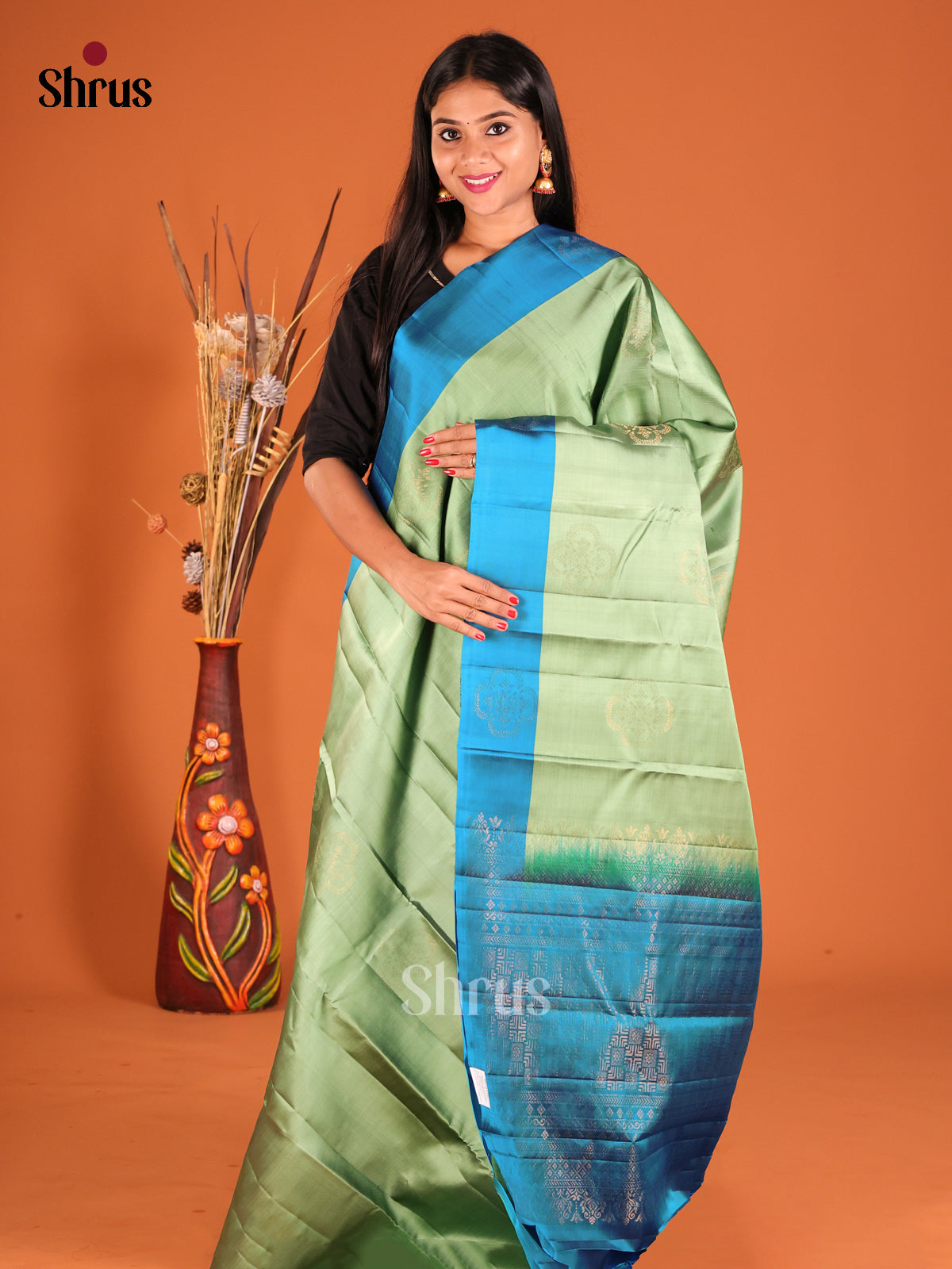 Pista Green & Blue Softsilk-halfpure Saree with zari floral buttas - Shop on Shrus.com