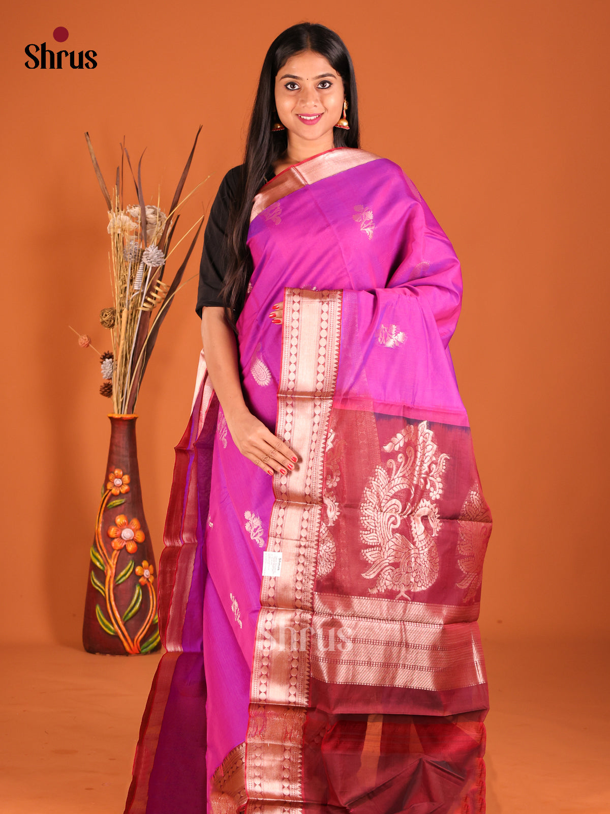 Pink & Maroon Silk Cotton Saree gleams with zari floral buttas