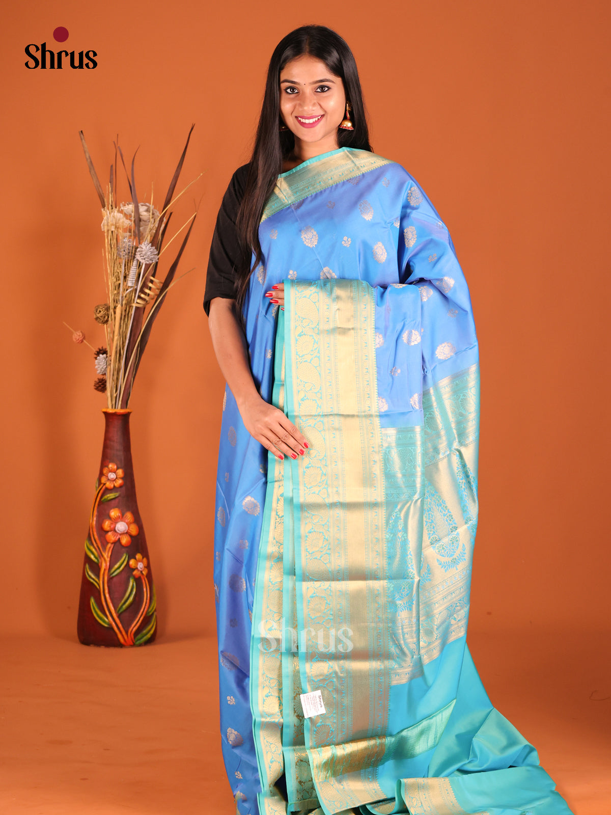Blue & Sky blue Softsilk-halfpure Saree with zari floral buttas