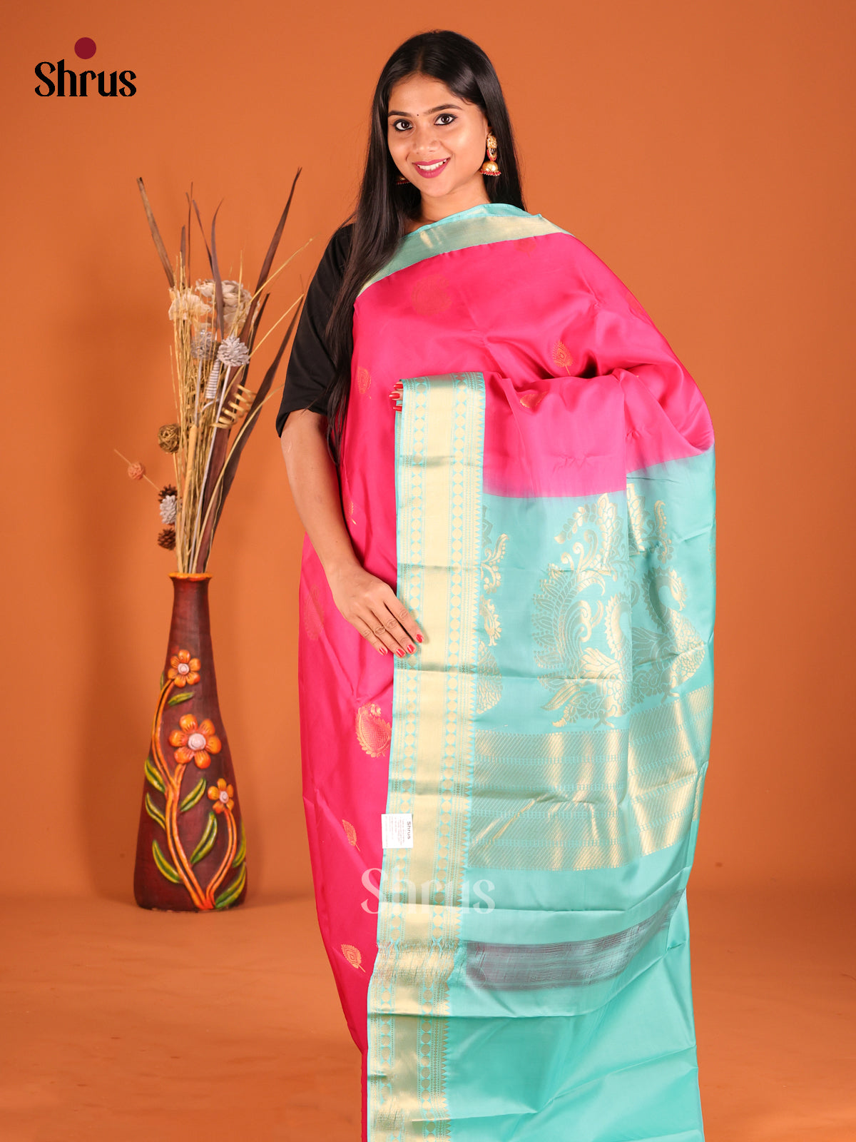 Pink & Teal Softsilk-halfpure Saree with zari motifs