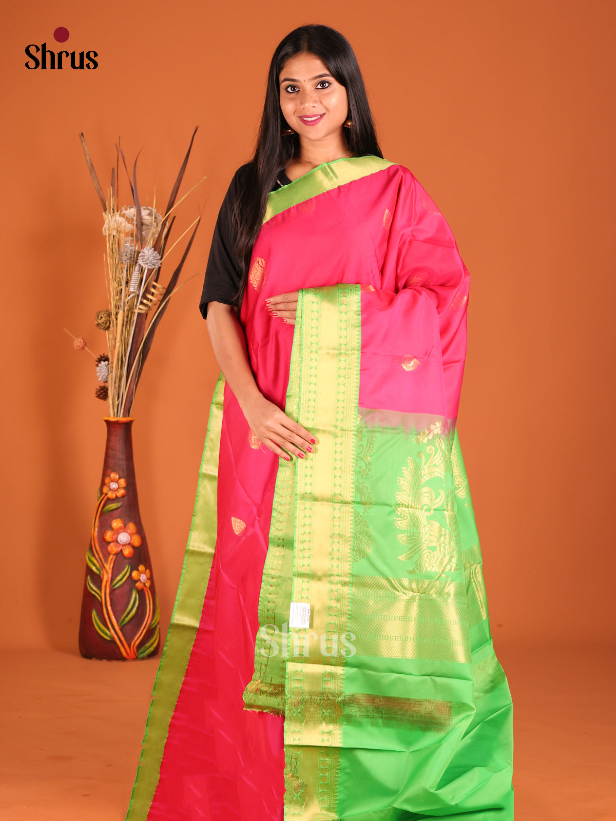 Pink & Green Softsilk-halfpure Saree gleams with zari floral buttas