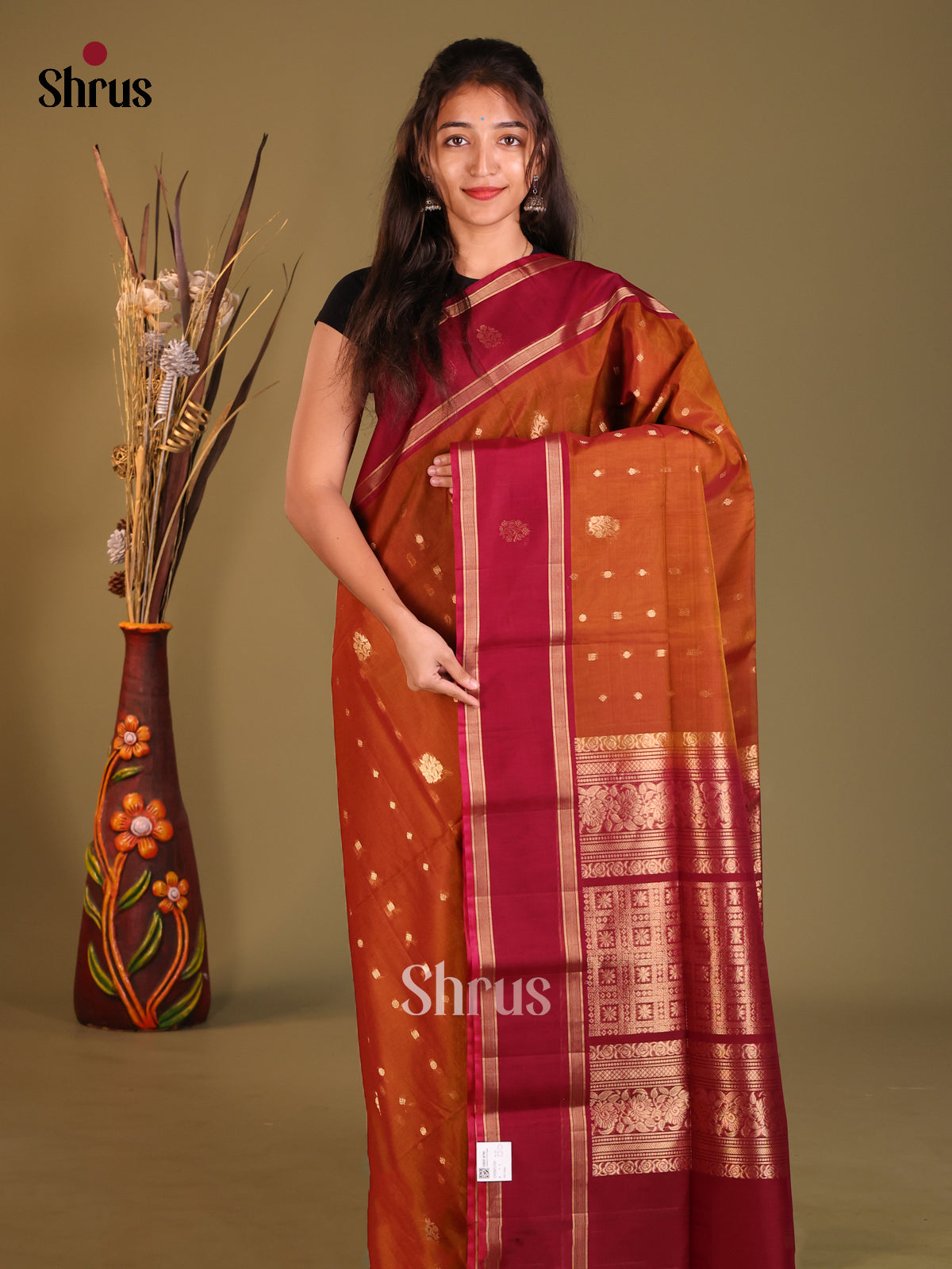 Rust & Maroon Silk Cotton Saree with zari floral buttas