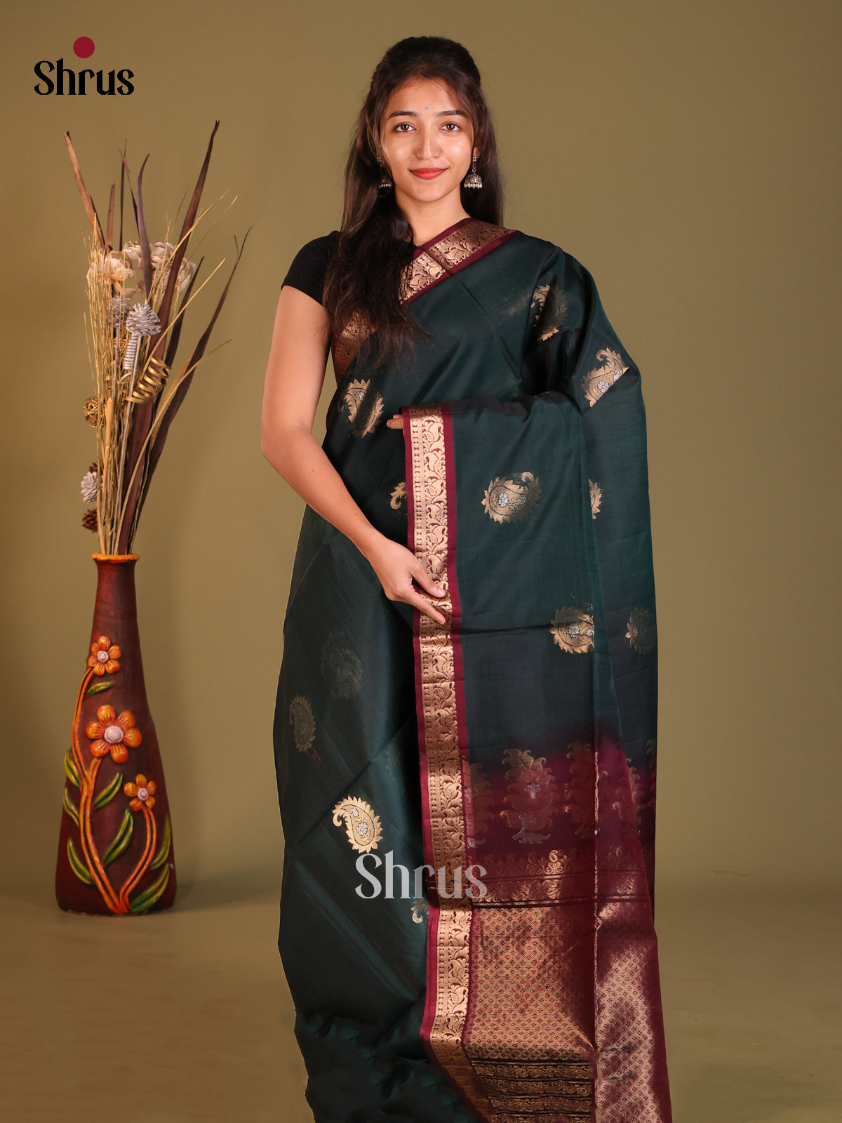 Peacock Green & Maroon Silk Cotton Saree with zari paisleys motifs
