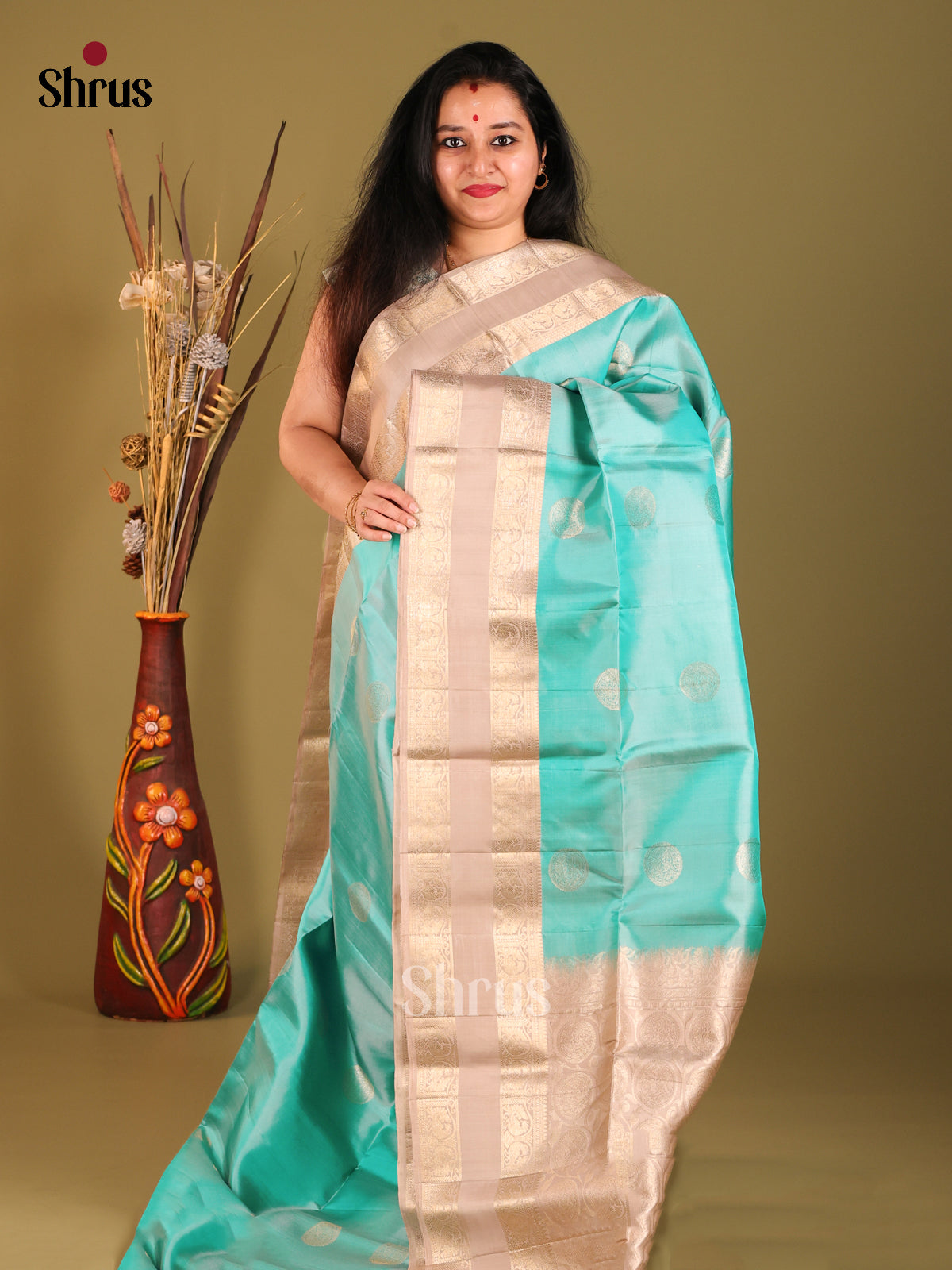 Luminous Turquoise Soft Silk Saree with Golden Motifs & Beige rettaipet Zari Border - Shop on Shrus.com