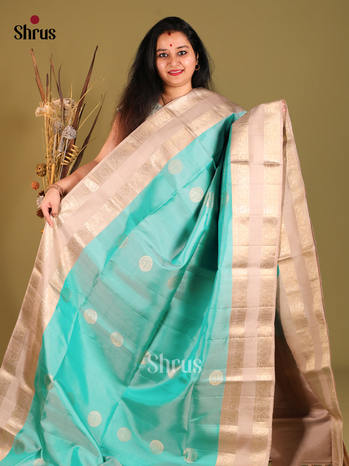 Luminous Turquoise Soft Silk Saree with Golden Motifs & Beige rettaipet Zari Border - Shop on Shrus.com