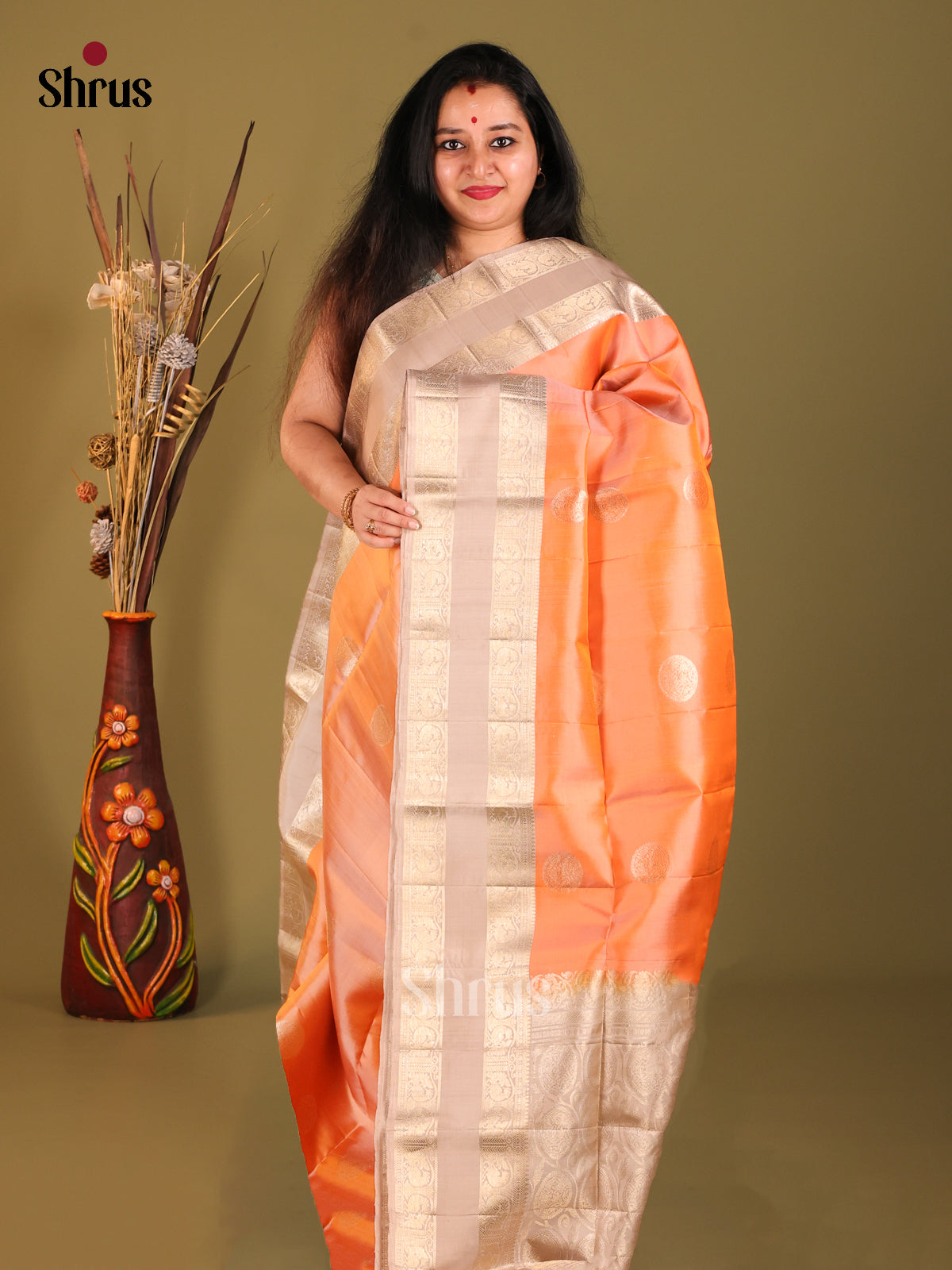 Breezy Peach Soft Silk Saree with Circular Motifs & Dusty Pink rettaipet zari border