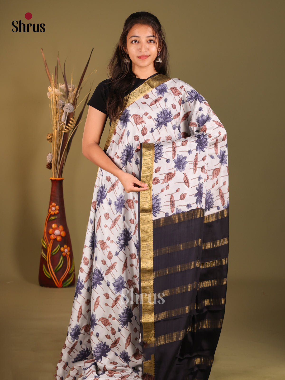 Captivating Light Blue Printed Mysore Silk Saree With Black Zari Border
