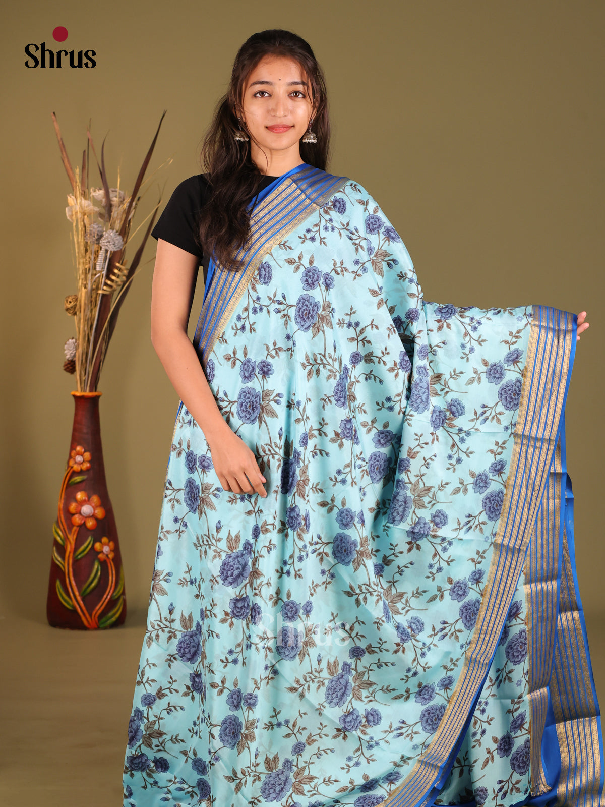 Striking Light Blue Mysore Silk Saree With Blue Zari Border