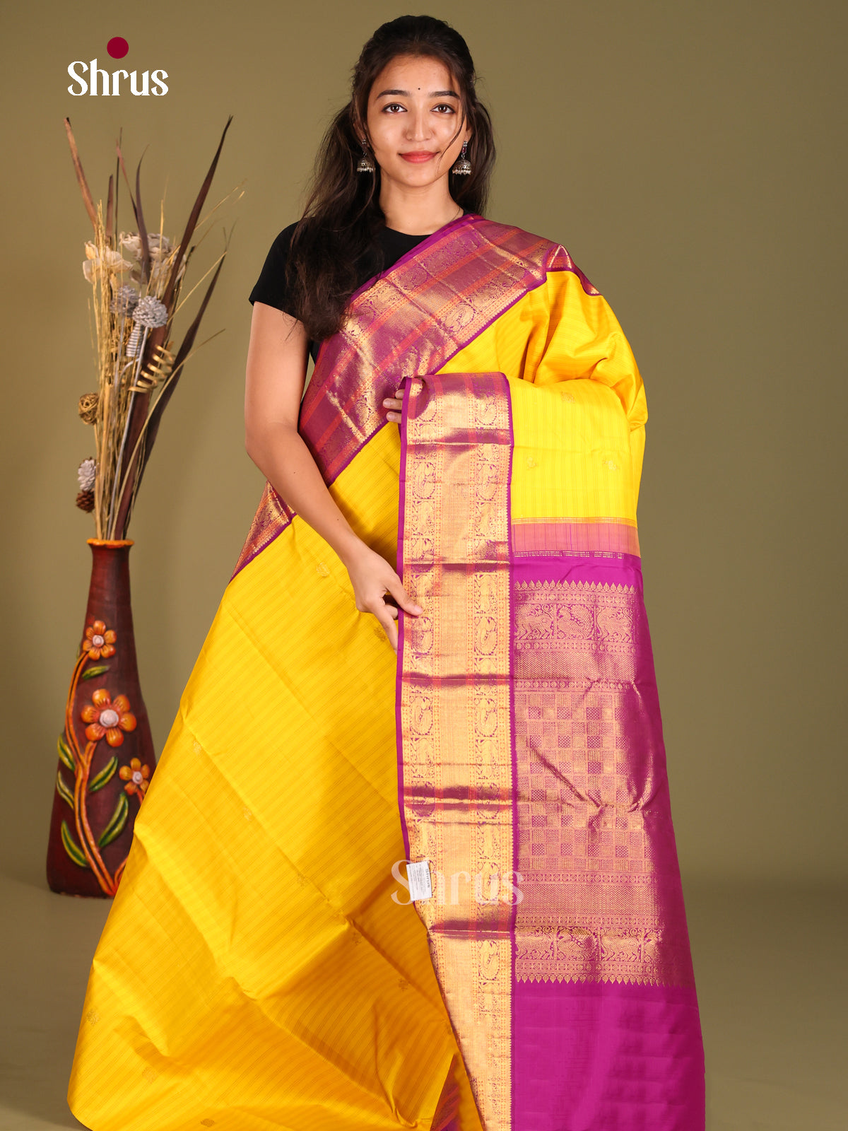 Radiant Korvai Yellow Kanchipuram Silk Saree with Subtle Stripes & Purple zari border