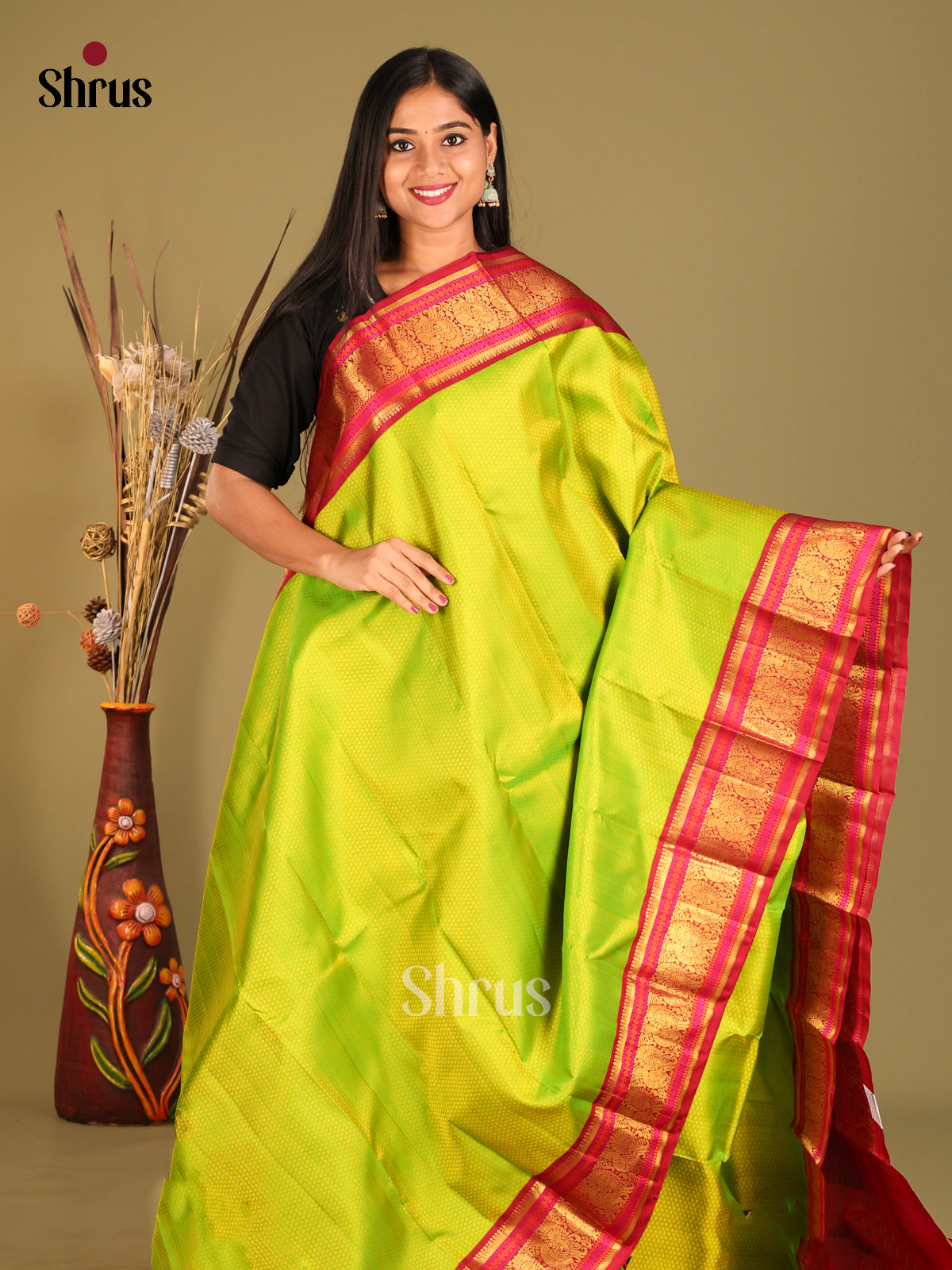 Korvai Parrot Green Kanchipuram Silk Saree with a Grand Maroon Rettaipet zari border