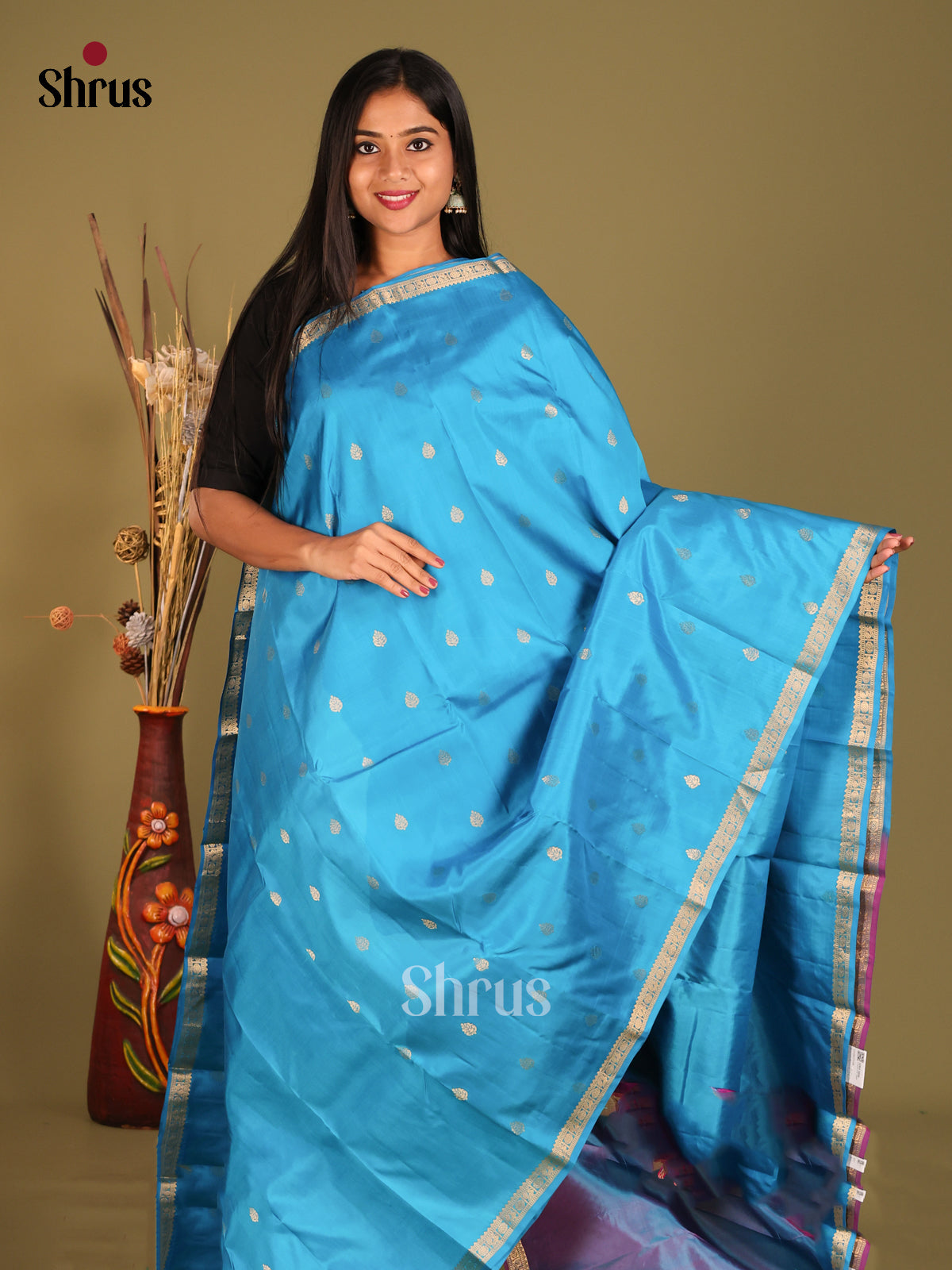 Serene Korvai Blue Kanchipuram Silk Saree with zari floral buttas & Purple Brocade Pallu 1